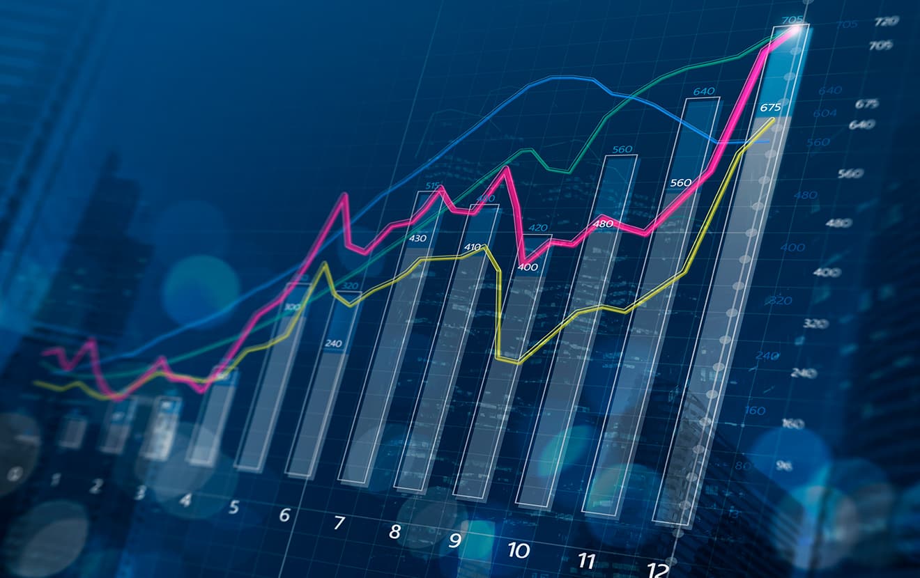 Business growth, progress or success concept. Financial bar chart and growing graphs with depth of field on dark blue background